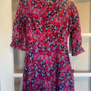 Wednesday’s girl, floral dress with a mini back cut-out